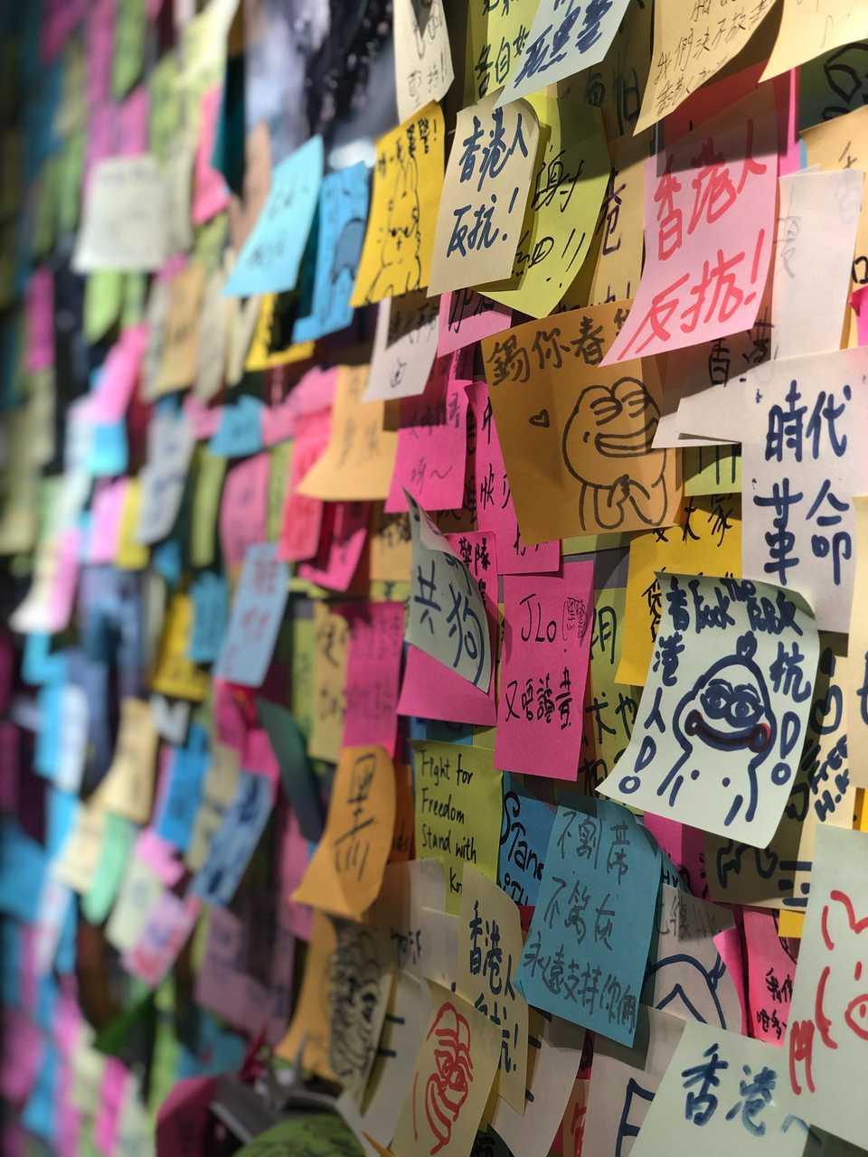 Sticky notes on a wall Sticky notes on a wall